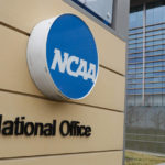 
              FILE - Signage at the headquarters of the NCAA is viewed in Indianapolis, March 12, 2020. Using name, image and likeness (NIL) compensation to recruit college athletes is still very much against NCAA rules. The recent de-commitment from Florida by blue chip quarterback Jaden Rashada shows that NIL is definitely a factor in decisions. (AP Photo/Michael Conroy, File)
            