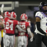 
              TCU cornerback Tre'Vius Hodges-Tomlinson (1) walks off the field after a Georgia touchdown during the first half of the national championship NCAA College Football Playoff game, Monday, Jan. 9, 2023, in Inglewood, Calif. (AP Photo/Marcio Jose Sanchez)
            