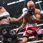 
              Gervonta Davis, left, delivers a shot to the head of Luis Garcia during their boxing match for the WBA lightweight title in Washington, Saturday, Jan. 7, 2023. (John McDonnell/The Washington Post via AP)
            