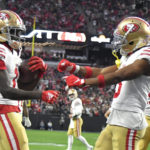 
              San Francisco 49ers wide receiver Brandon Aiyuk, left, celebrates with Ray-Ray McCloud III after scoring during the first half of an NFL football game between the San Francisco 49ers and Las Vegas Raiders, Sunday, Jan. 1, 2023, in Las Vegas. (AP Photo/David Becker)
            