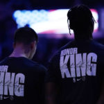 
              Indiana Pacers' Bennedict Mathurin, right, and T.J. McConnell, left, wear shirts honoring Martin Luther King Jr. during the National Anthem before an NBA basketball game against the Milwaukee Bucks, Monday, Jan. 16, 2023, in Milwaukee. (AP Photo/Aaron Gash)
            