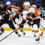 
              Philadelphia Flyers defenseman Tony DeAngelo, right, is pursued by Buffalo Sabres left wing Victor Olofsson (71) during the first period of an NHL hockey game, Monday, Jan. 9, 2023, in Buffalo, N.Y. (AP Photo/Jeffrey T. Barnes)
            