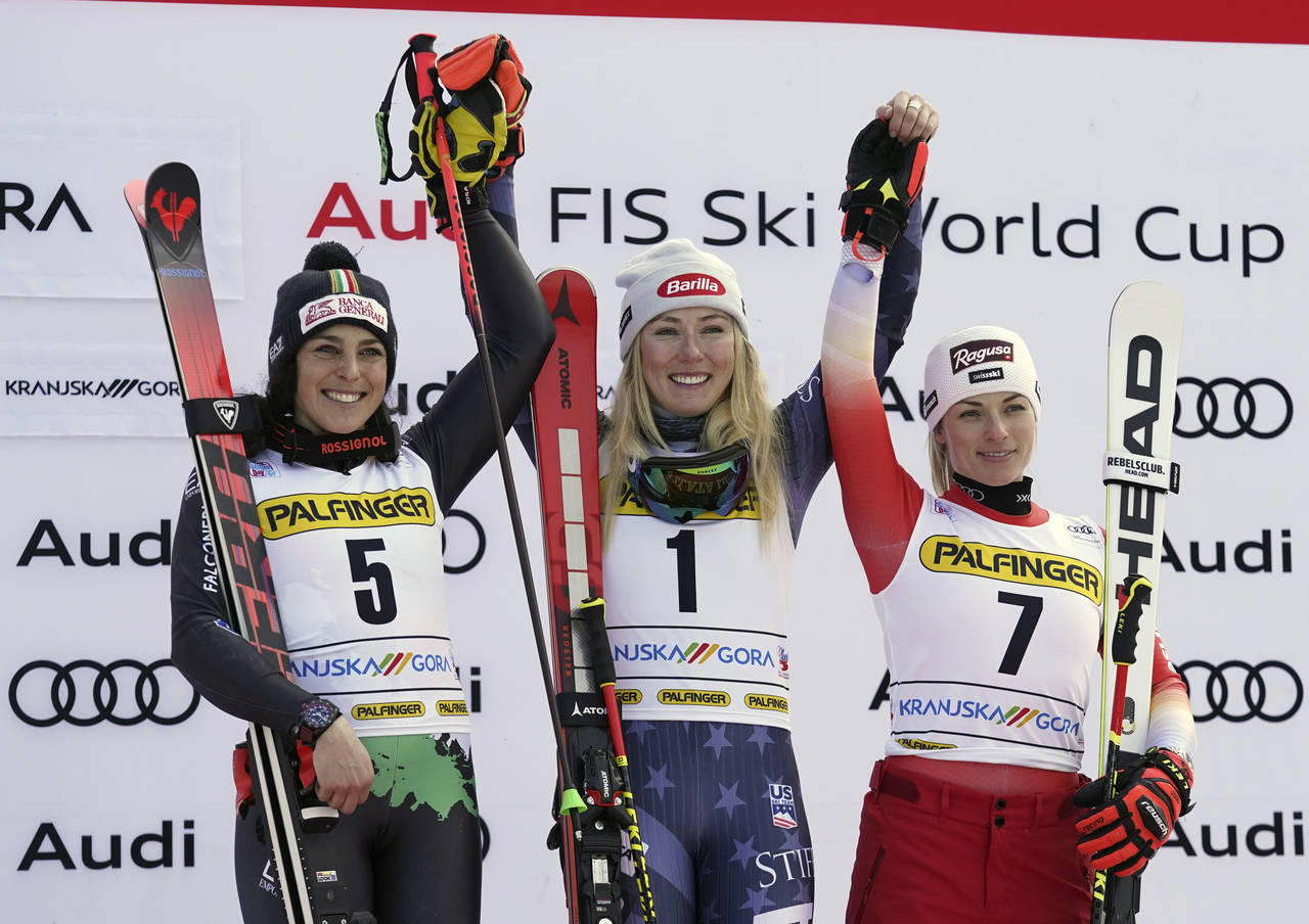 United States' Mikaela Shiffrin, center, winner of an alpine ski, women's World Cup giant slalom ra...