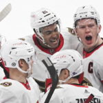 
              Ottawa Senators' Brady Tkachuk (7) celebrates with teammates after scoring against the Montreal Canadiens during the third period of an NHL hockey game, Tuesday, Jan. 31, 2023 in Montreal. (Graham Hughes/The Canadian Press via AP)
            
