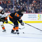 
              Philadelphia Flyers' Travis Sanheim (6) and Anaheim Ducks' Trevor Zegras (11) battle for the puck during the first period of an NHL hockey game, Tuesday, Jan. 17, 2023, in Philadelphia. (AP Photo/Matt Slocum)
            