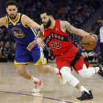 
              Toronto Raptors guard Fred VanVleet (23) drives to the basket against Golden State Warriors guard Klay Thompson (11) during the first half of an NBA basketball game in San Francisco, Friday, Jan. 27, 2023. (AP Photo/Jed Jacobsohn)
            