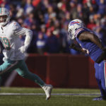 
              Miami Dolphins quarterback Skylar Thompson (19), left, looks to throw during the first half of an NFL wild-card playoff football game against the Buffalo Bills, Sunday, Jan. 15, 2023, in Orchard Park, N.Y. (AP Photo/Joshua Bessex)
            