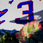 
              A sign with the number of Buffalo Bills' Damar Hamlin is seen for the display set-up outside of University of Cincinnati Medical Center, Wednesday, Jan. 4, 2023, in Cincinnati. Hamlin was taken to the hospital after collapsing on the field during the Bill's NFL football game against the Cincinnati Bengals on Monday night. (AP Photo/Aaron Doster)
            
