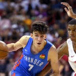 
              FILE - Oklahoma City Thunder's Chet Holmgren (7) drives against Houston Rockets' Jabari Smith II during the second half of an NBA summer league basketball game, July 9, 2022, in Las Vegas. It’s reasonable to think Chet Holmgren will be an NBA All-Star one day. He was a highly recruited high school player whose one year at Gonzaga was stellar enough for Oklahoma City to make him the No. 2 pick in last year’s draft. He's an obvious talent, an enormous talent. (AP Photo/David Becker, File)
            