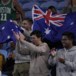 
              Supporters cheer during a match between Andy Murray of Britain and Thanasi Kokkinakis of Australia at the Australian Open tennis championship in Melbourne, Australia, Friday, Jan. 20, 2023. (AP Photo/Ng Han Guan)
            