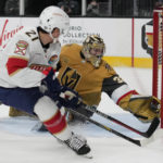 
              Vegas Golden Knights goaltender Adin Hill (33) blocks a shot by Florida Panthers center Nick Cousins (21) during the third period of an NHL hockey game Thursday, Jan. 12, 2023, in Las Vegas. (AP Photo/John Locher)
            