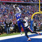 
              New England Patriots cornerback Jonathan Jones (31) pushes Buffalo Bills wide receiver Stefon Diggs (14) out of bounds on a potential touchdown catch during the first half of an NFL football game, Sunday, Jan. 8, 2023, in Orchard Park. (AP Photo/Adrian Kraus)
            