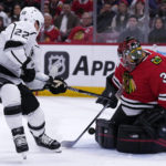 
              Chicago Blackhawks goaltender Petr Mrazek, right, saves a shot by Los Angeles Kings left wing Kevin Fiala during the first period of an NHL hockey game in Chicago, Sunday, Jan. 22, 2023. (AP Photo/Nam Y. Huh)
            