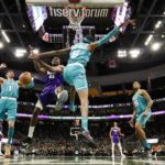 
              Charlotte Hornets' Jalen McDaniels blocks the shot of Milwaukee Bucks' Thanasis Antetokounmpo during the second half of an NBA basketball game Friday, Jan. 6, 2023, in Milwaukee. (AP Photo/Morry Gash)
            