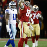 
              San Francisco 49ers tight end George Kittle (85) celebrates after catching a pass against the Dallas Cowboys during the second half of an NFL divisional round playoff football game in Santa Clara, Calif., Sunday, Jan. 22, 2023. (AP Photo/Josie Lepe)
            