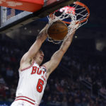 
              Chicago Bulls guard Alex Caruso (6) dunks against the Cleveland Cavaliers during the first half of an NBA basketball game, Monday, Jan. 2, 2023, in Cleveland. (AP Photo/Ron Schwane)
            