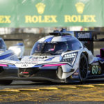 
              The Meyer Shank Racing Acura ARX-06 passes the High Class Racing ORECA LMP2 07 in a turn during a practice session for the Rolex 24 hour auto race at Daytona International Speedway, Thursday, Jan. 26, 2023, in Daytona Beach, Fla. (AP Photo/John Raoux)
            