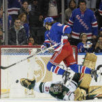 
              New York Rangers left wing Artemi Panarin (10) scores the winning goal against Minnesota Wild goaltender Marc-Andre Fleury (29) during the shootout of an NHL hockey game, Tuesday, Jan. 10, 2023, at Madison Square Garden in New York. The Rangers won 4-3. (AP Photo/Mary Altaffer)
            