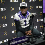 
              TCU cornerback Tre'Vius Hodges-Tomlinson speaks during a media day ahead of the national championship NCAA College Football Playoff game between Georgia and TCU, Saturday, Jan. 7, 2023, in Los Angeles. The champoinship football game will be played Monday. (AP Photo/Marcio Jose Sanchez)
            