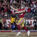 
              San Francisco 49ers running back Christian McCaffrey celebrates after scoring against the Dallas Cowboys during the second half of an NFL divisional playoff football game in Santa Clara, Calif., Sunday, Jan. 22, 2023. (AP Photo/Godofredo A. Vásquez)
            