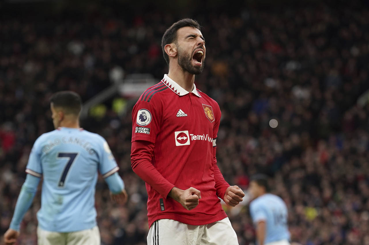 Manchester United's Bruno Fernandes shouts after missing an opportunity to score during the English...