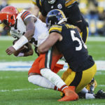 
              Cleveland Browns quarterback Deshaun Watson (4) is sacked by Pittsburgh Steelers linebacker Alex Highsmith (56) during the second half of an NFL football game in Pittsburgh, Sunday, Jan. 8, 2023. (AP Photo/Matt Freed)
            