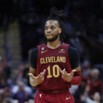 
              Cleveland Cavaliers guard Darius Garland celebrates after making a 3-point basket during the second half of an NBA basketball game against the New Orleans Pelicans, Monday, Jan. 16, 2023, in Cleveland. (AP Photo/Ron Schwane)
            