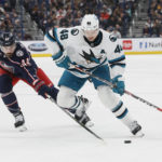 
              San Jose Sharks' Tomas Hertl, right, keeps the puck away from Columbus Blue Jackets' Erik Gudbranson during the first period of an NHL hockey game on Saturday, Jan. 21, 2023, in Columbus, Ohio. (AP Photo/Jay LaPrete)
            