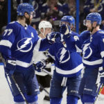 
              Tampa Bay Lightning defenseman Victor Hedman (77) celebrates his goal against the Los Angeles Kings with center Steven Stamkos (91) during the third period of an NHL hockey game Saturday, Jan. 28, 2023, in Tampa, Fla. (AP Photo/Chris O'Meara)
            