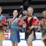 
              Bradie Tennell, Isabeau Levito, Amber Glenn and Starr Andrews, from left, hold up their medals after the women's free skate at the U.S. figure skating championships in San Jose, Calif., Friday, Jan. 27, 2023. Levito finished first, Tennell finished second, Glenn finished third and Andrews finished fourth in the event. (AP Photo/Josie Lepe)
            