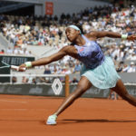 
              FILE - Coco Gauff returns the ball to Sloane Stephens during their quarterfinal match of the French Open tennis tournament at the Roland Garros stadium Tuesday, May 31, 2022 in Paris. Gauff acknowledges she tends to be in a bit of a hurry as she moves through life. (AP Photo/Jean-Francois Badias, File)
            