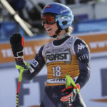 
              United States' Mikaela Shiffrin celebrates at the finish area of an alpine ski, women's World Cup downhill race, in Cortina d'Ampezzo, Italy, Saturday, Jan. 21, 2023. (AP Photo/Alessandro Trovati)
            