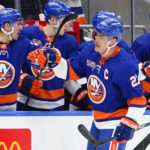 
              New York Islanders' Anders Lee celebrates with teammates after scoring a goal during the first period of an NHL hockey game against the Dallas Stars Tuesday, Jan. 10, 2023, in Elmont, N.Y. (AP Photo/Frank Franklin II)
            