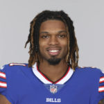 
              FILE - Damar Hamlin of the Buffalo Bills NFL football team smiles May 12, 2021. Damar Hamlin plans to support young people through education and sports with the $8.6 million in GoFundMe donations that unexpectedly poured into his toy drive fundraiser after he suffered a cardiac arrest in the middle of a game last week.(AP Photo)
            