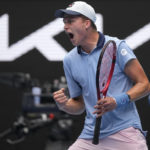
              Jenson Brooksby of the U.S. reacts after winning the first set against Casper Ruud of Norway in their second round match at the Australian Open tennis championship in Melbourne, Australia, Thursday, Jan. 19, 2023. (AP Photo/Dita Alangkara)
            