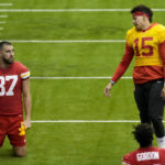
              Kansas City Chiefs tight end Travis Kelce (87) and quarterback Patrick Mahomes (15) talk during an NFL football workout Wednesday, Jan. 25, 2023, in Kansas City, Mo. The Chiefs are scheduled to play the Cincinnati Bengals Sunday in the AFC championship game. (AP Photo/Charlie Riedel)
            