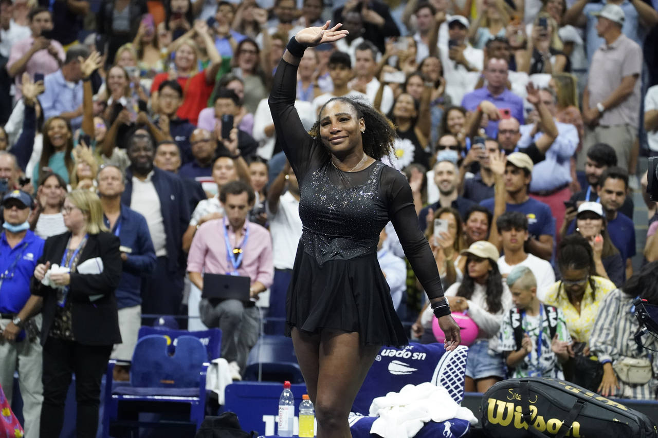 FILE - Serena Williams waves to fans after losing to Ajla Tomljanovic in the third round of the U.S...