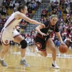 
              Nebraska's Maddie Krull (42) goes to the basket against Indiana's Mackenzie Holmes (54) during the first half of an NCAA college basketball game, Sunday, Jan. 1, 2023, in Bloomington, Ind. (AP Photo/Darron Cummings)
            