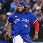 
              FILE - Toronto Blue Jays' Vladimir Guerrero Jr. celebrates after the team's win over the Tampa Bay Rays in a baseball game Sept. 14, 2022, in Toronto. Guerrero and the Blue Jays avoided salary arbitration Friday night, Jan. 13, by agreeing to a $14.5 million contract for next season. (Frank Gunn/The Canadian Press via AP, File)
            