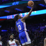 
              Philadelphia 76ers' Tyrese Maxey goes up for a shot during the first half of an NBA basketball game against the Detroit Pistons, Tuesday, Jan. 10, 2023, in Philadelphia. (AP Photo/Matt Slocum)
            