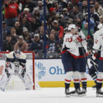 
              Washington Capitals players celebrate their goal against Columbus Blue Jackets' Elvis Merzlikins during the second period of an NHL hockey game on Thursday, Jan. 5, 2023, in Columbus, Ohio. (AP Photo/Jay LaPrete)
            