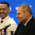 
              Agent Scott Boras, right, speaks to the media next to Minnesota Twins baseball player Carlos Correa during a press conference at Target Field Wednesday, Jan. 11, 2023, in Minneapolis. The team and Correa agreed to a six-year, $200 million contract. (AP Photo/Abbie Parr)
            