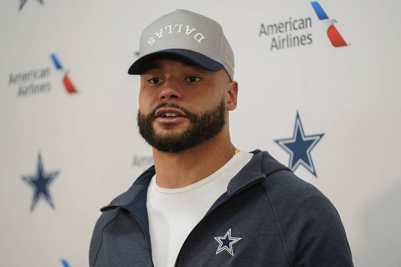 Dallas Cowboys quarterback Dak Prescott (4) speaking to member of the media at the end of an NFL fo...