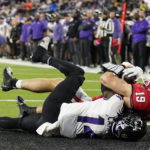 
              Georgia tight end Brock Bowers (19) makes a touchdown catch against TCU safety Abraham Camara (14) during the second half of the national championship NCAA College Football Playoff game, Monday, Jan. 9, 2023, in Inglewood, Calif. (AP Photo/Marcio Jose Sanchez)
            