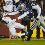 
              Washington Commanders wide receiver Terry McLaurin (17) makes a catch for a first down against Dallas Cowboys cornerback Trayvon Mullen (37) during the second half an NFL football game, Sunday, Jan. 8, 2023, in Landover, Md. (AP Photo/Patrick Semansky)
            