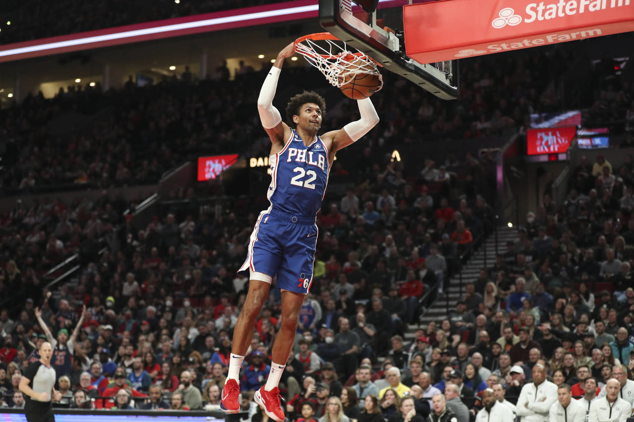 Philadelphia 76ers guard Matisse Thybulle (22) dunks against the Portland Trail Blazers during the ...