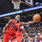
              Toronto Raptors forward Pascal Siakam (43) tries to save the ball from going out of bounds during the first half of an NBA basketball game against the Milwaukee Bucks in Toronto on Wednesday, Jan. 4, 2023. (Christopher Katsarov/The Canadian Press via AP)
            
