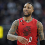 
              Portland Trail Blazers guard Damian Lillard argues after he was called for a foul during the second half of the tema's NBA basketball game against the Denver Nuggets on Tuesday, Jan. 17, 2023, in Denver. (AP Photo/David Zalubowski)
            
