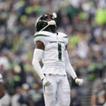 
              New York Jets cornerback Sauce Gardner (1) celebrates a defensive stop against the Seattle Seahawks during the first half of an NFL football game, Sunday, Jan. 1, 2023, in Seattle. (AP Photo/Godofredo A. Vásquez)
            