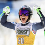 
              Norway's Kajsa Vickhoff Lie celebrates at the finish area of an alpine ski, women's World Cup downhill race, in Cortina d'Ampezzo, Italy, Saturday, Jan. 21, 2023. (AP Photo/Alessandro Trovati)
            